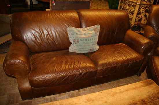 Appraisal: CONTEMPORARY BROWN DISTRESSED LEATHER TWO-CUSHION OVER-STUFFED STYLE SOFA - in