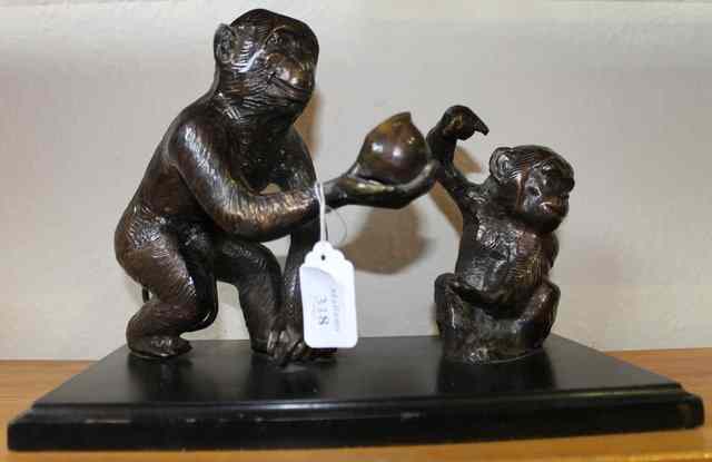 Appraisal: A LATE TH CENTURY BRONZE GROUP OF PRIMATES an adult