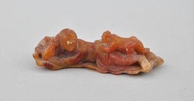 Appraisal: Carved Agate Mother and Baby Yellow agate with orange striations