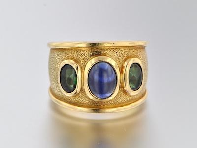 Appraisal: A Sapphire and Tourmaline Band Tested k yellow gold band