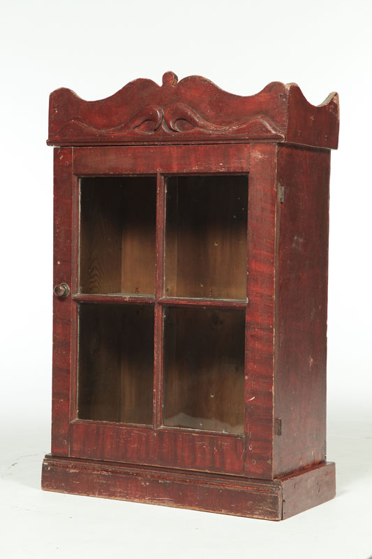 Appraisal: FOLKSY HANGING CUPBOARD Possibly Midwestern th century cherry chestnut and