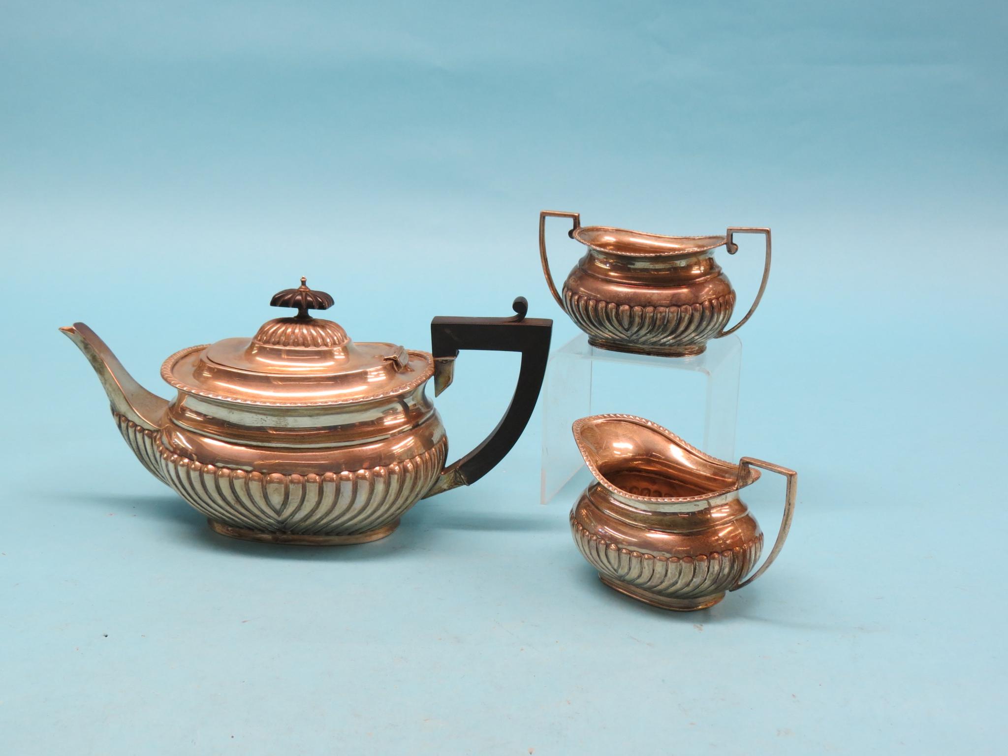 Appraisal: An Edward VII silver half-fluted teapot Birmingham and a near-matching