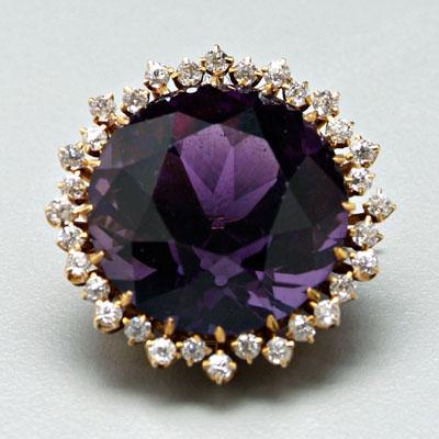 Appraisal: Diamond and amethyst brooch one round modified brilliant-cut amethyst estimated