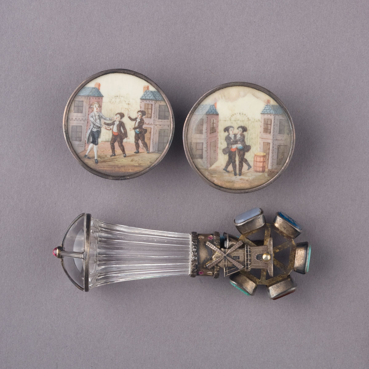 Appraisal: PAIR OF ENGLISH ENAMEL-PAINTED GENTLEMAN'S CLOTHING ORNAMENTS LATE EIGHTEENTH-NINETEENTH CENTURY