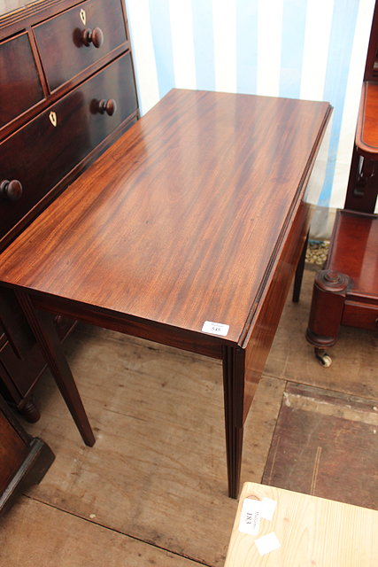 Appraisal: A GEORGE III RECTANGULAR MAHOGANY PEMBROKE TABLE with end drawer