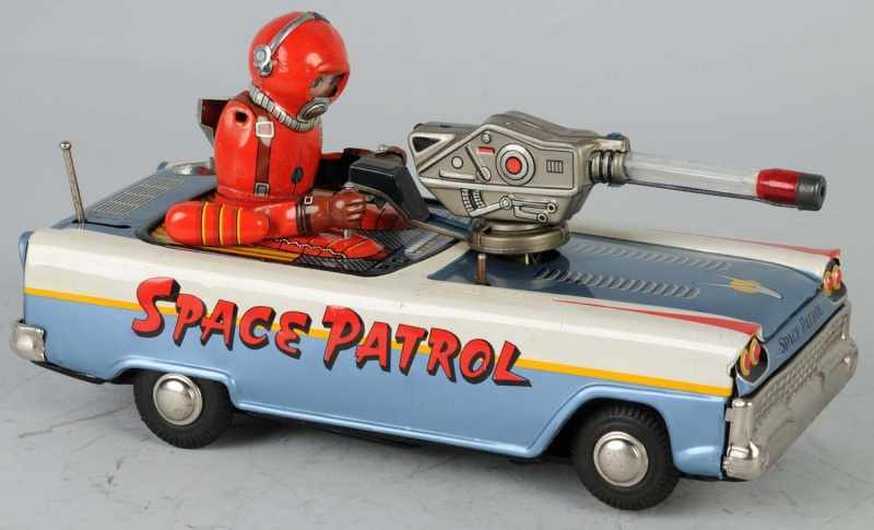 Appraisal: Tin Space Patrol Battery-Operated Toy Description Japanese Working Marked Space