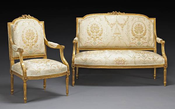 Appraisal: A Louis XVI style giltwood five piece salon suite early