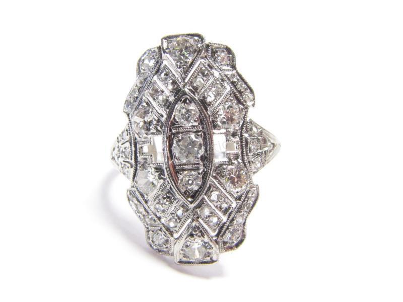 Appraisal: K White Gold Vintage filigree style ring with approximately forty-seven