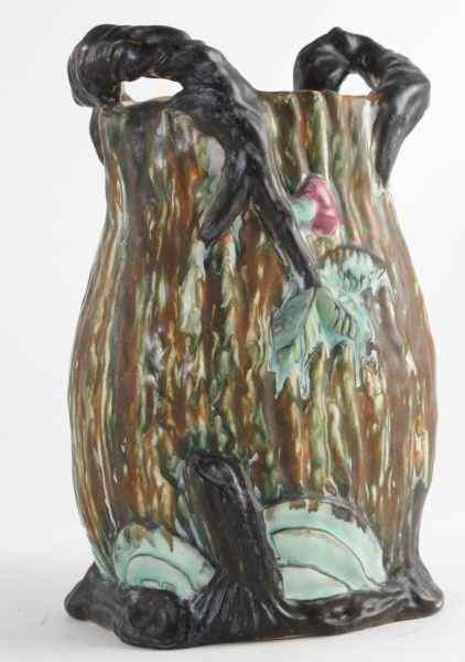 Appraisal: Weller Pottery Vasenaturalistic form of tree trunk with flowering vines