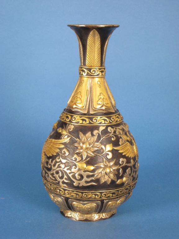 Appraisal: A Chinese bronze baluster shaped Vase with gilt detail of