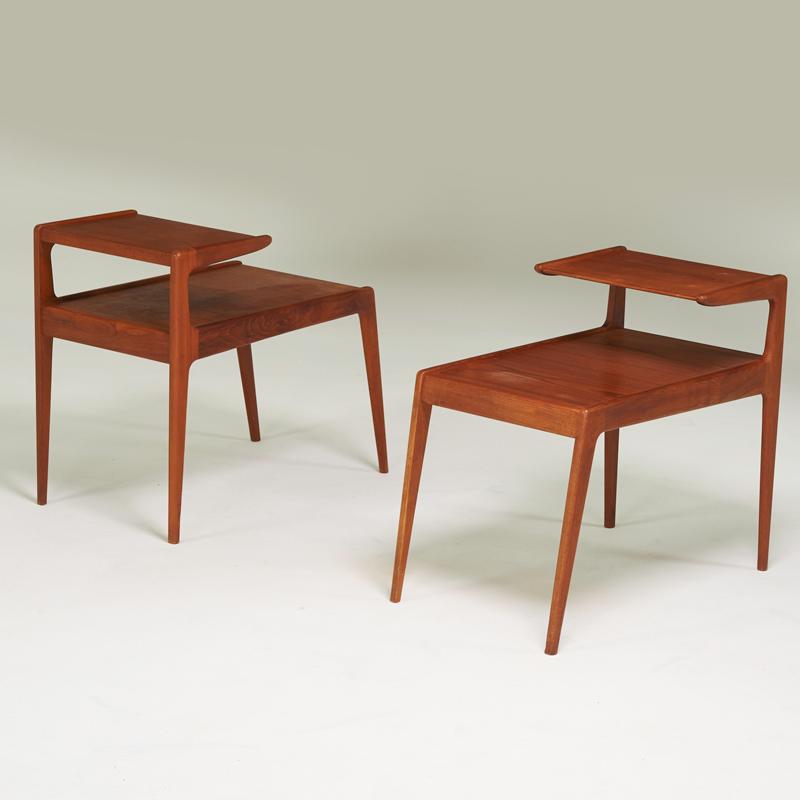 Appraisal: KURT OSTERVIG Pair of teak tiered side tables Denmark s