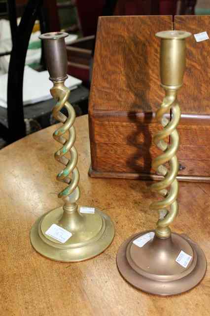 Appraisal: AN OAK HANGING WALL SHELF originally supplied by Crick House