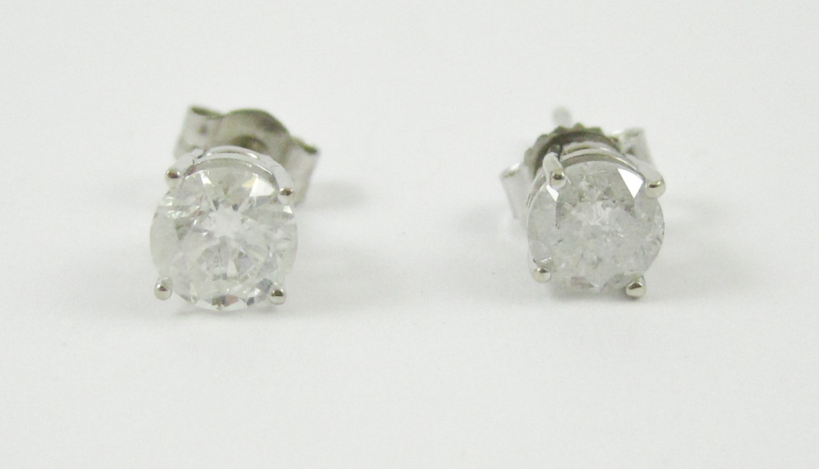 Appraisal: PAIR OF DIAMOND AND WHITE GOLD EAR STUDS each k