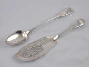 Appraisal: Georgian silver fiddle pattern serving pieces A crested serving spoon