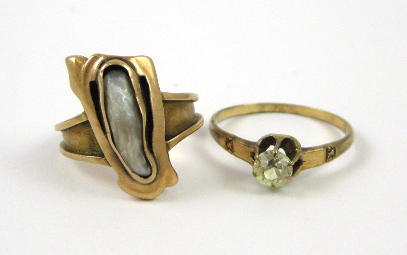 Appraisal: TWO FOURTEEN KARAT GOLD RINGS including a k yellow gold