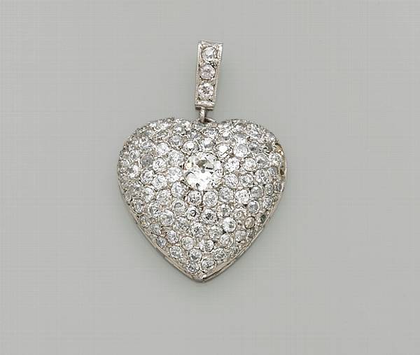 Appraisal: A diamond and platinum heart pendant estimated total diamond weight