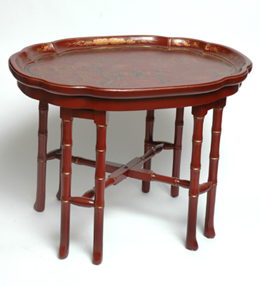 Appraisal: A REGENCY STYLE CHINOISERIE RED LACQUERED TRAY ON STAND The