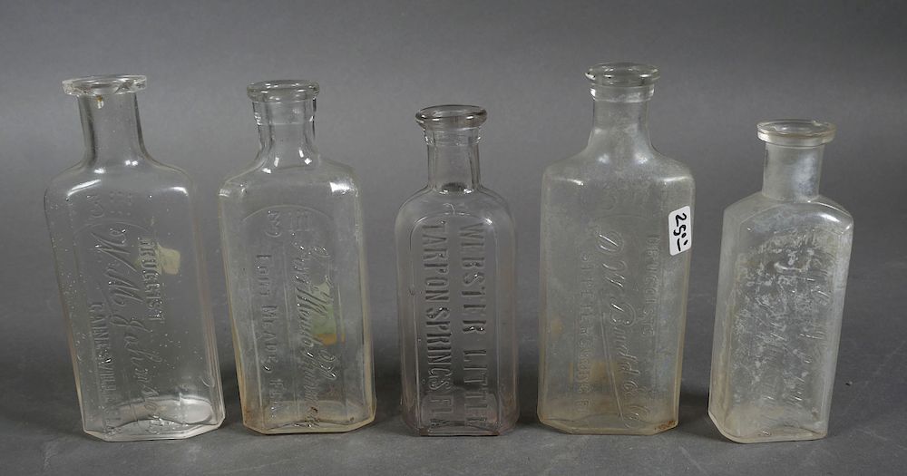 Appraisal: Antique Florida Glass Medicine Bottles Five clear glass antique Florida