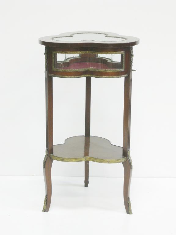 Appraisal: A th Century Bijouterie Table of trefoil form with glazed