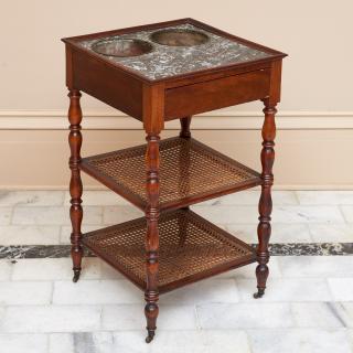 Appraisal: Restauration mahogany rafraichissoir Restauration mahogany rafraichissoir th c French fossilized