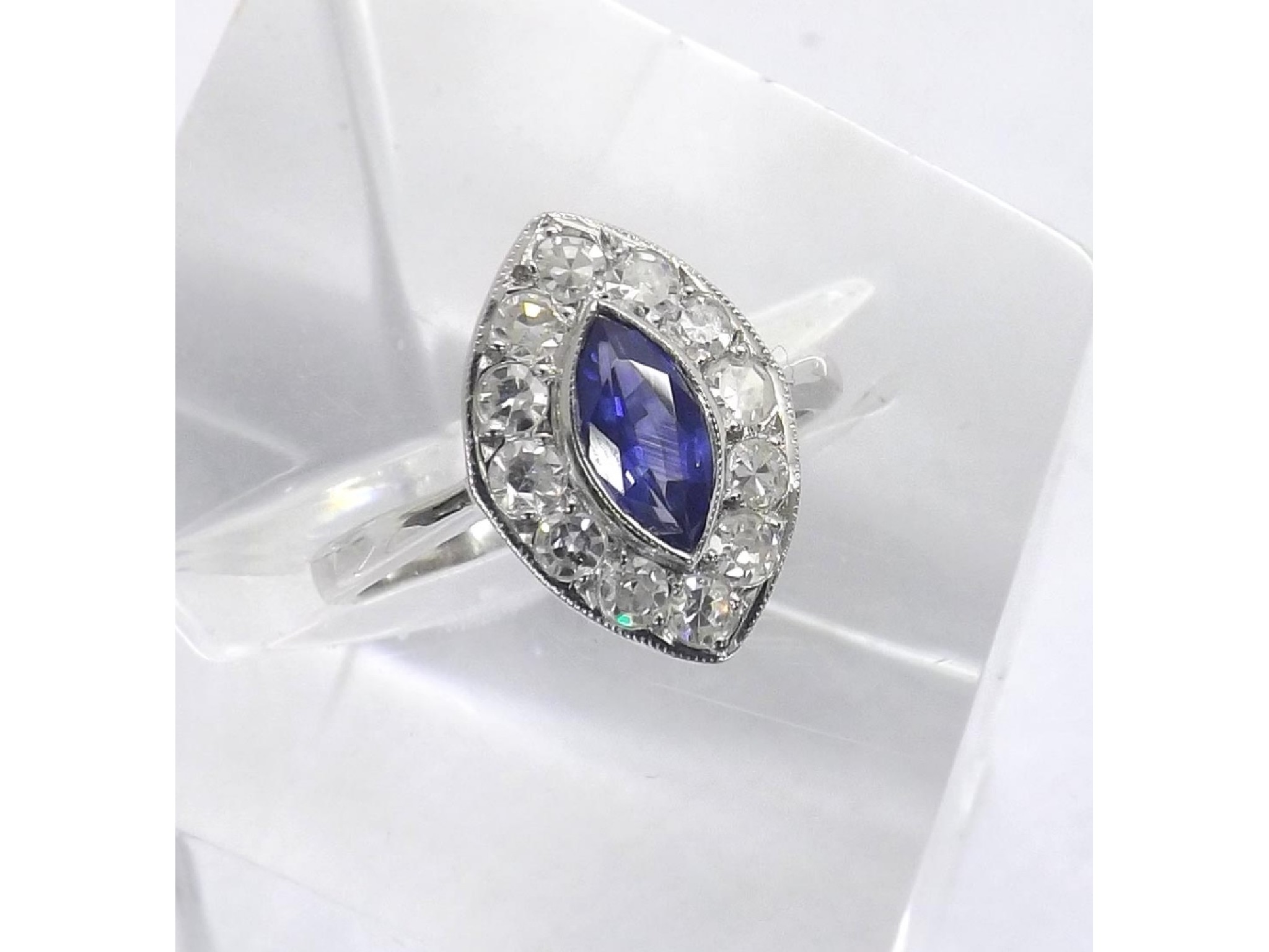 Appraisal: ct white gold marquise shape sapphire and diamond cluster ring