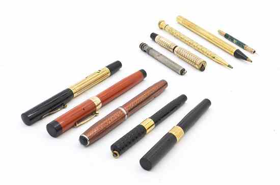 Appraisal: A Collection of Writing Utensils comprising calligraphy pens including examples