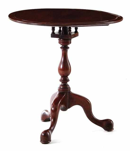 Appraisal: Georgian style mahogany tilt-top table th century circular top upon