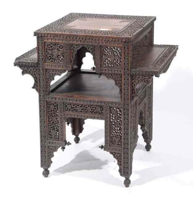 Appraisal: A BURMESE CARVED HARDWOOD OCCASIONAL TABLE the top with leaf