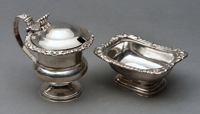 Appraisal: A GEORGE III URN SHAPED SILVER MUSTARD POT with shell