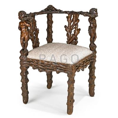 Appraisal: RENAISSANCE STYLE CARVED CORNER CHAIR Carved walnut frame with putti