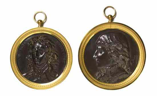 Appraisal: Two French Gilt and Patinated Bronze Portrait Medallions each depicting