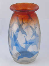 Appraisal: A glass vase the clear body with blue diving birds