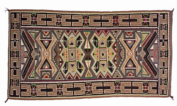 Appraisal: A Navajo Teec Nos Pos rug A series of eccentric