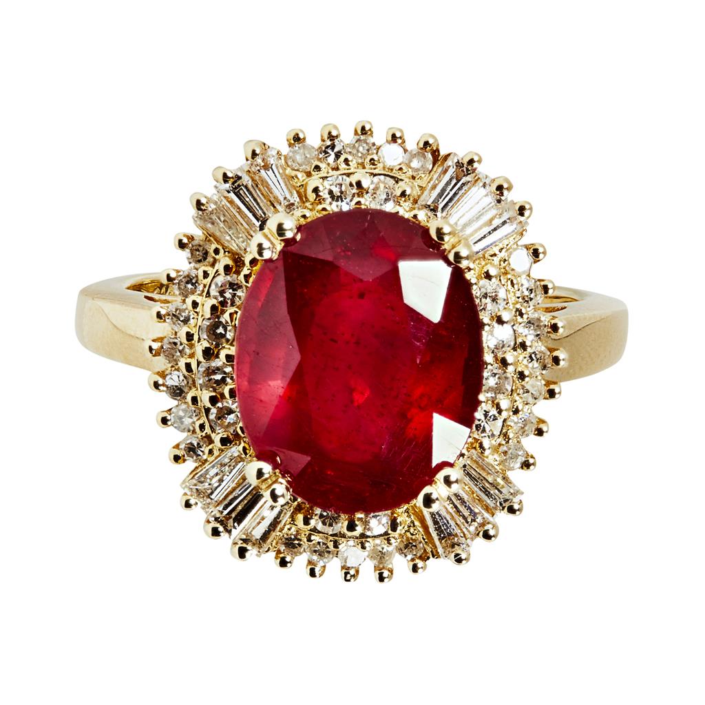 Appraisal: A ruby and diamond set cluster ring claw set with