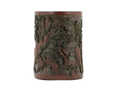 Appraisal: A large Chinese bamboo brushpot deeply carved with a mountainous