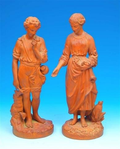 Appraisal: A pair of Torquay Terracotta Co Ltd figures of a