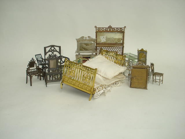 Appraisal: Miniature soft metal suite The silver and gilt filigree set