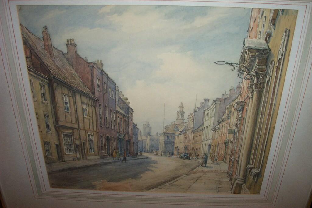 Appraisal: A watercolour and pencil drawing of a city street scene