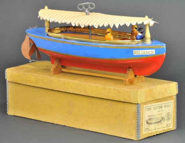 Appraisal: SCHOENHUT BOXED MOTORBOAT c very rare clockwork powered boat features