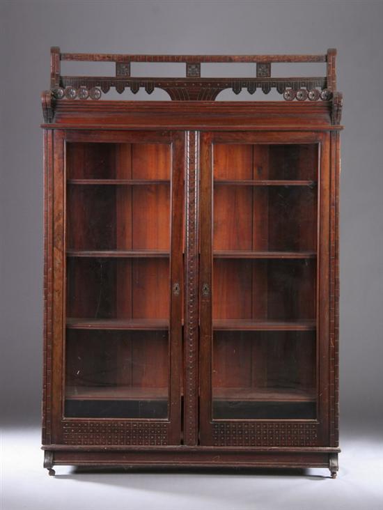 Appraisal: PAIR EASTLAKE CARVED MAHOGANY CABINETS Circa Raised superstructure with pendant-carved