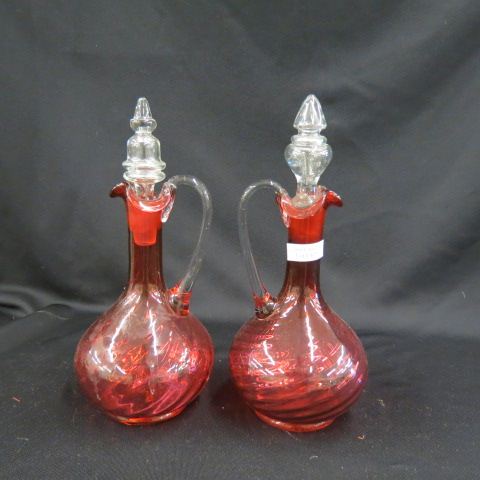 Appraisal: Pair of Cranberry Art Glass Decanters swirl decor