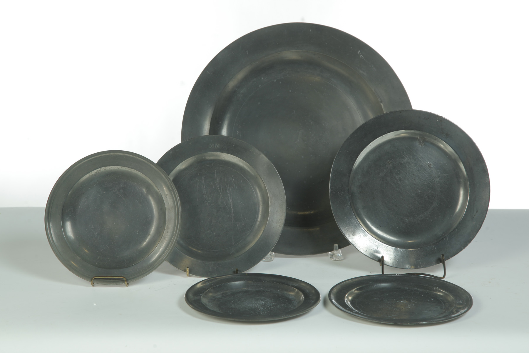 Appraisal: SIX PEWTER PLATES OF VARIOUS SIZES England st half- th