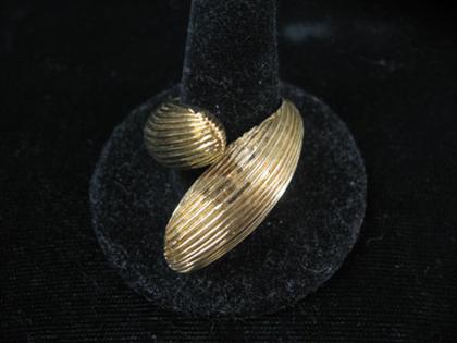 Appraisal: karat yellow gold wrap ring Deep textured gold in wrap