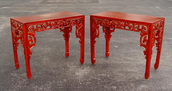 Appraisal: PAIR OF CHINESE CARVED HIGH TABLES Iron red painted finish