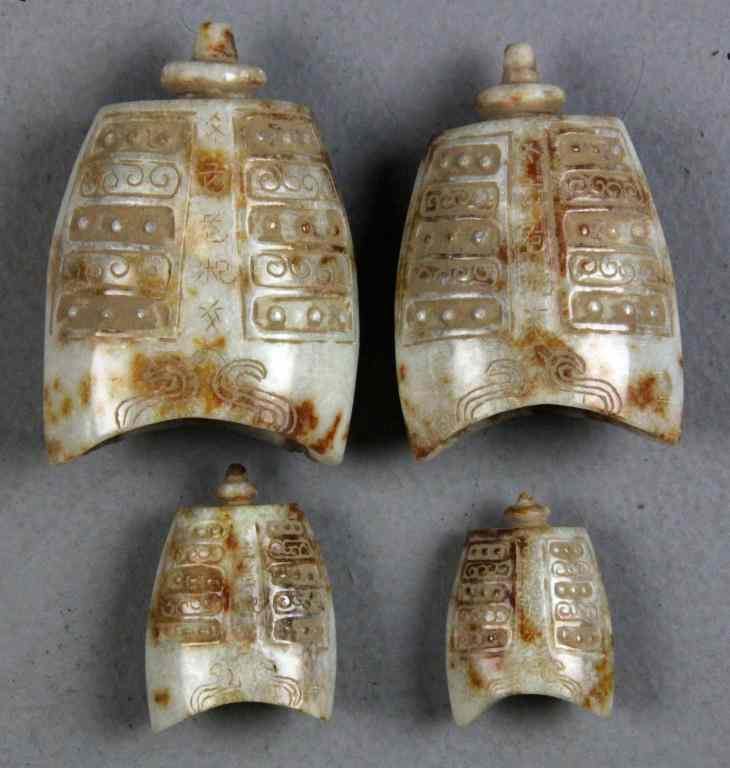 Appraisal: Pcs Chinese Archaic Style Hardstone BellsCarved in the archaic style