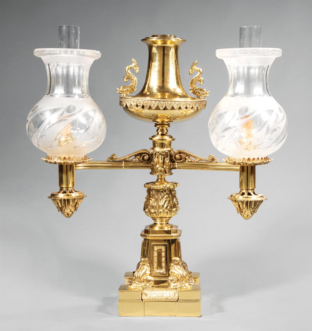 Appraisal: English Gilt Bronze Double-Arm Argand Lamp c font flanked by