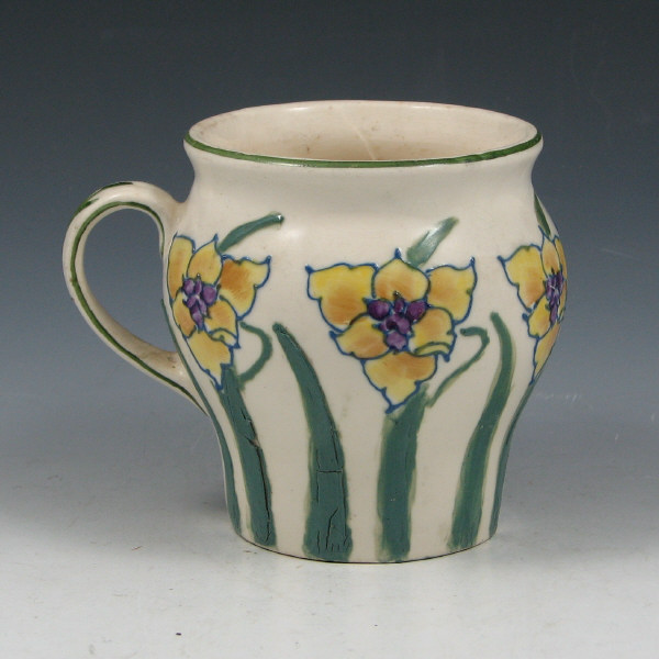 Appraisal: Avon Faience handled cup with yellow and purple squeezebag-decorated tradescantia