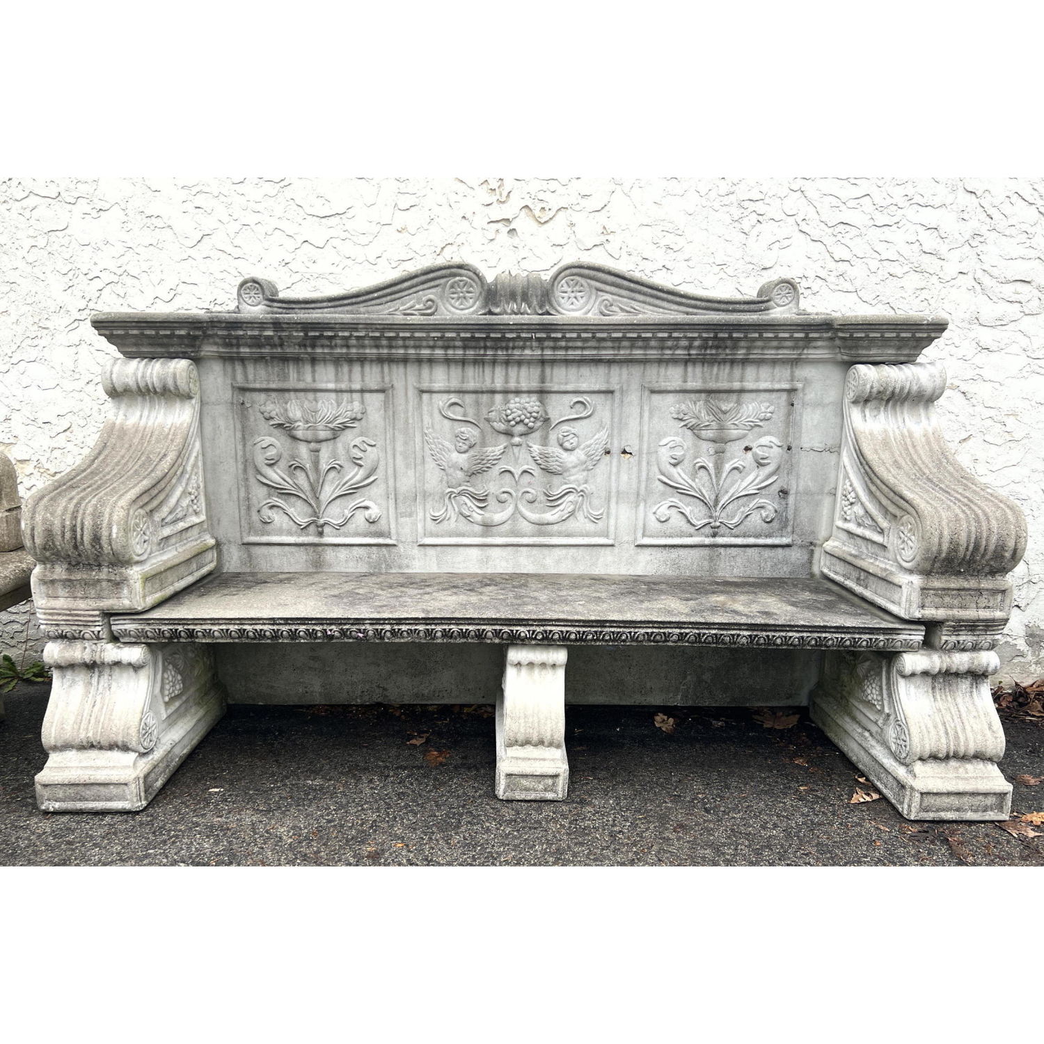 Appraisal: foot cement garden bench with wing cherub and thistle back