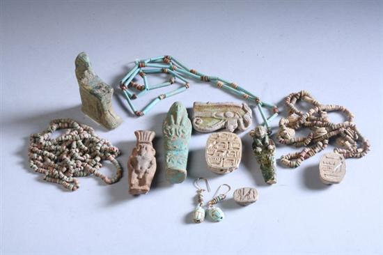 Appraisal: TWO EGYPTIAN FAIENCE SCARABS Late period Together with mummy beads