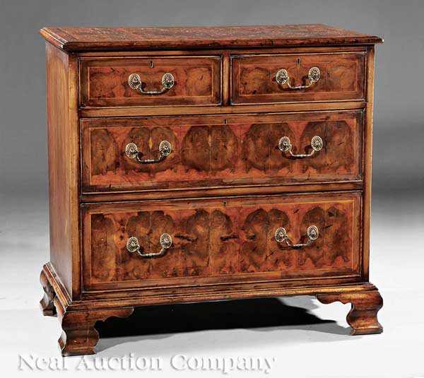 Appraisal: An Antique George II-Style Oyster Walnut Chest molded top two